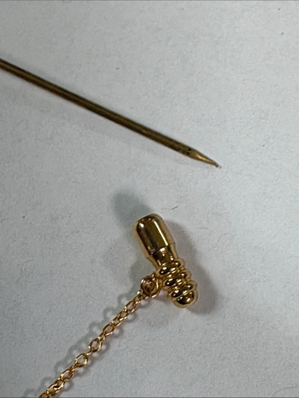 Gold-Tone Stick Brooch with Red and Cream Glass Beads
